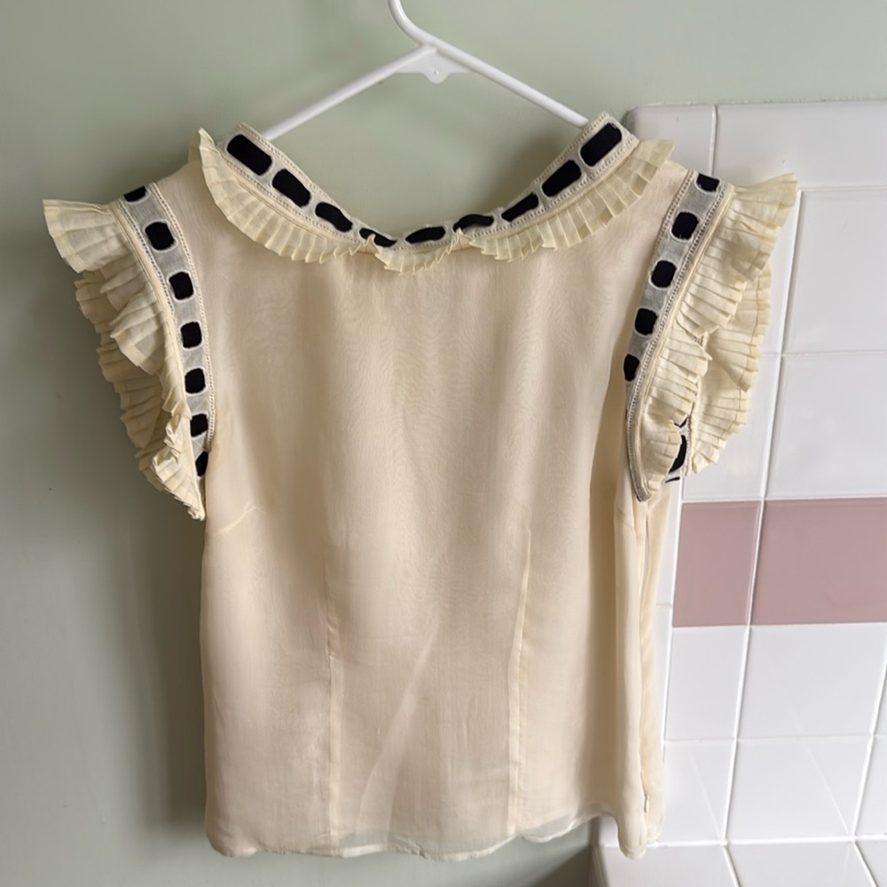 Catherine Malandrino blouse
Has one small spot on the inside collar.